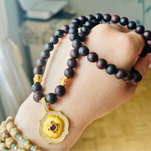Elegant Wooden Bead Necklace with Gold Accents